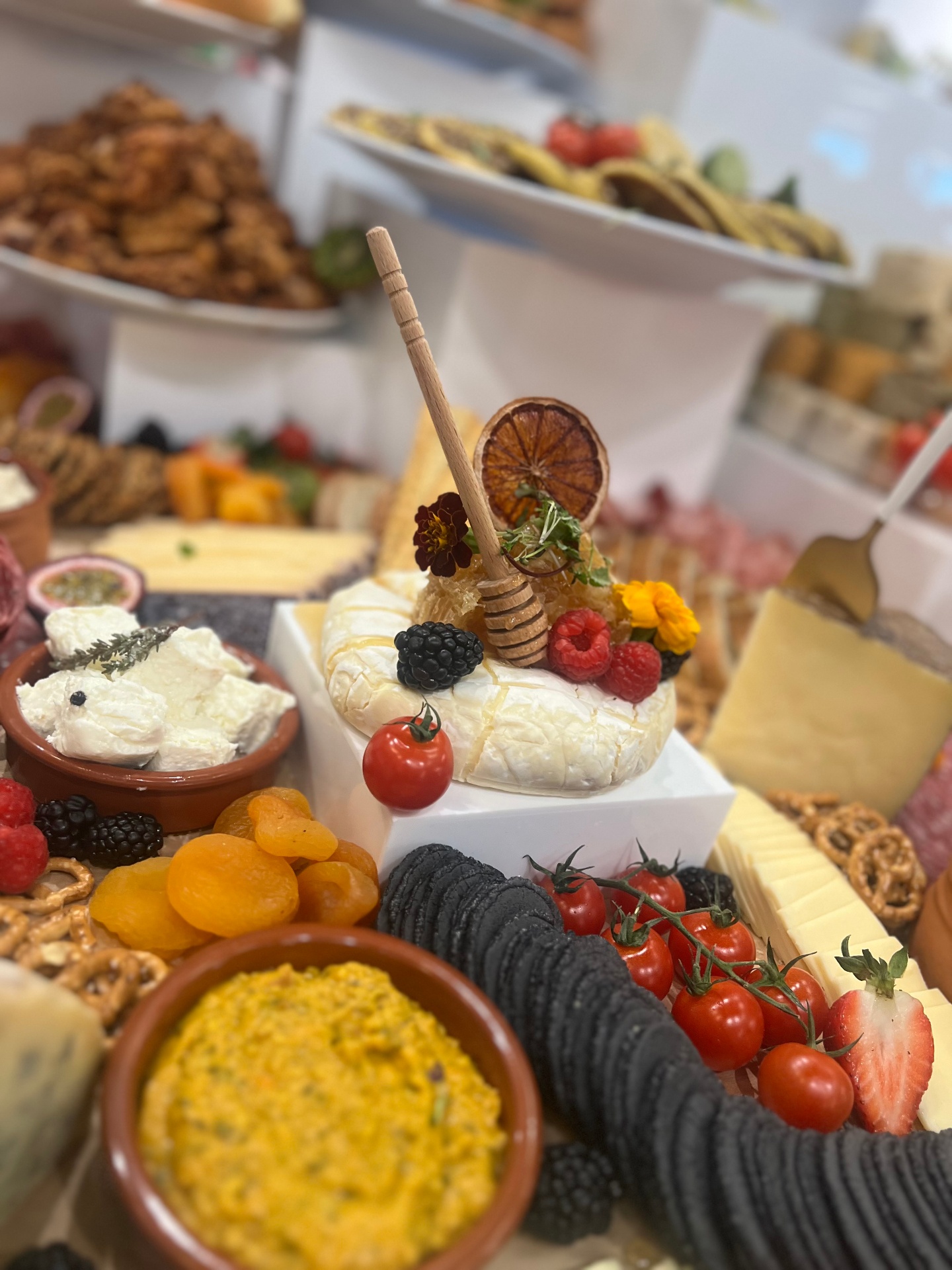 Baked brie with honeycomb and berries centrepiece