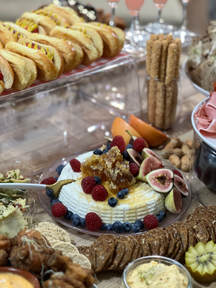 Baked brie with honeycomb, berries and party grazing items