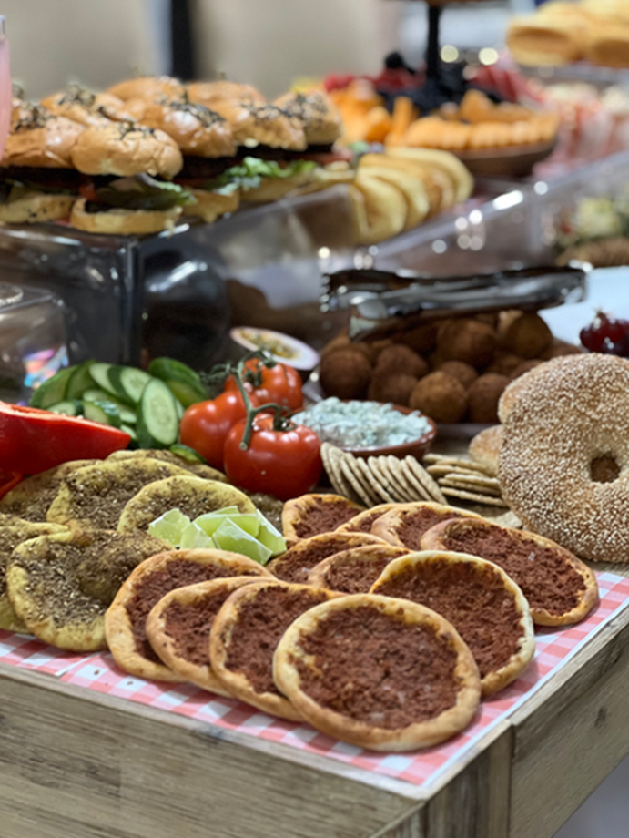 Flatbreads, bagels, tomatoes and grazing platter details
