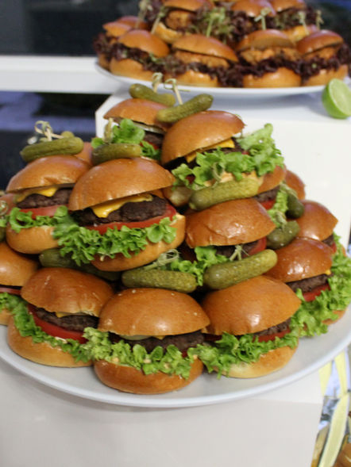 Stacked slider burgers styled for a catering event