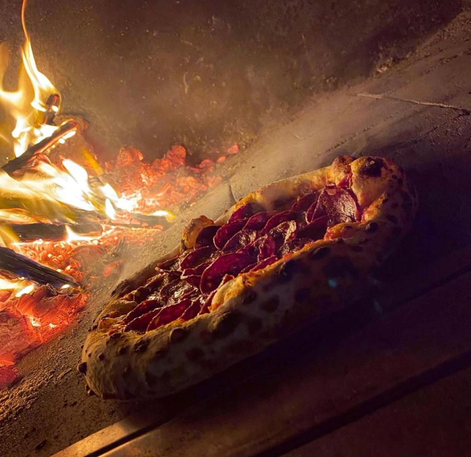 Wood-fired pizza catering at a Sydney event